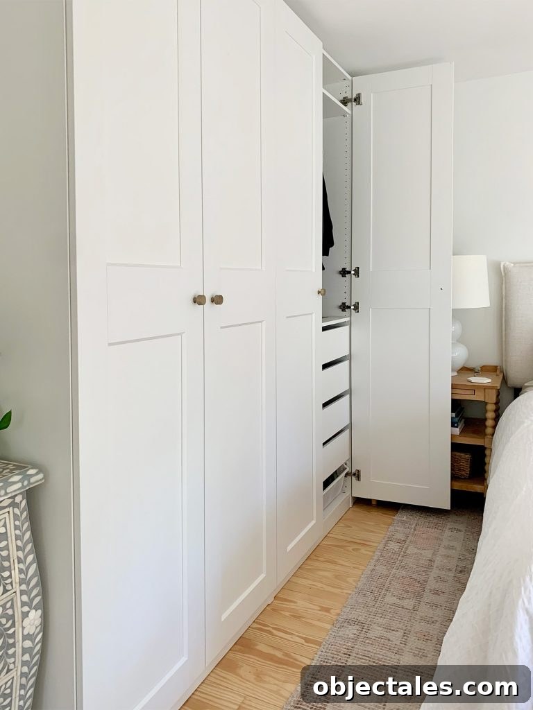 Open Closet Door To Ikea Pax Wardrobe System Next To Bed