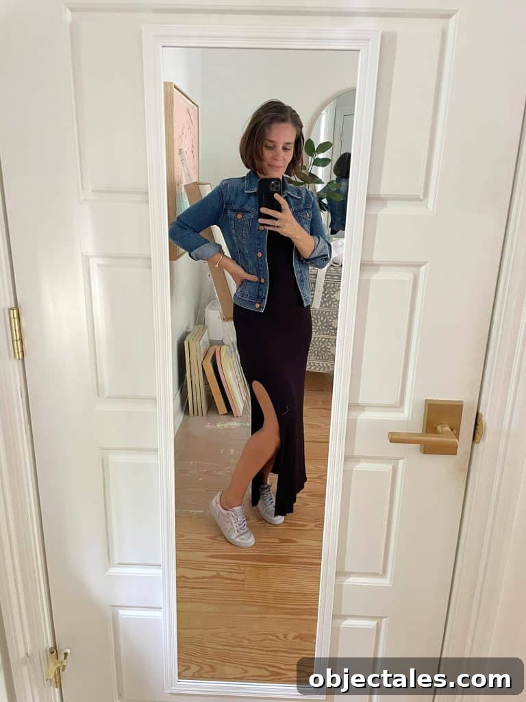 Sherry selfie in mirror at home with long black dress and jean jacket and tennis shoes