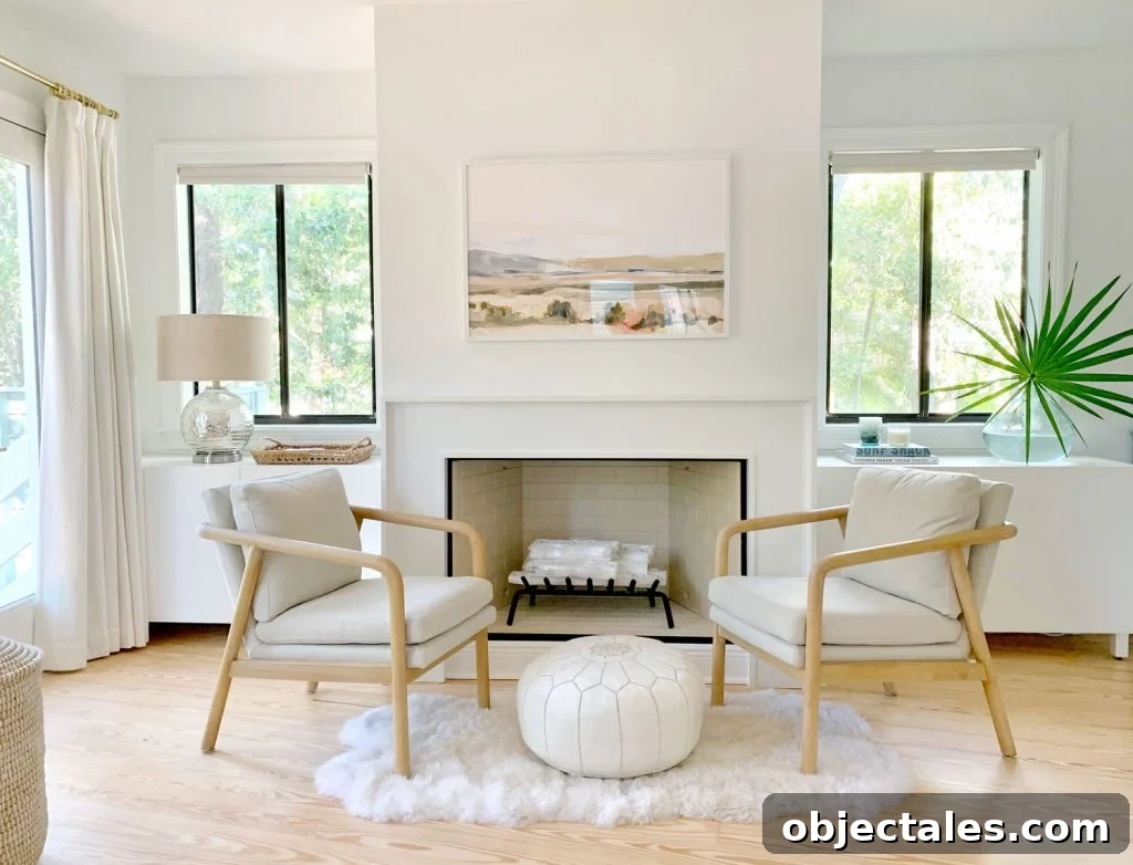 Convert IKEA Besta Cabinets Into Custom Built-Ins 4 Bedroom fireplace view with two chairs and Ikea Besta cabinets sitting on either side of fireplace