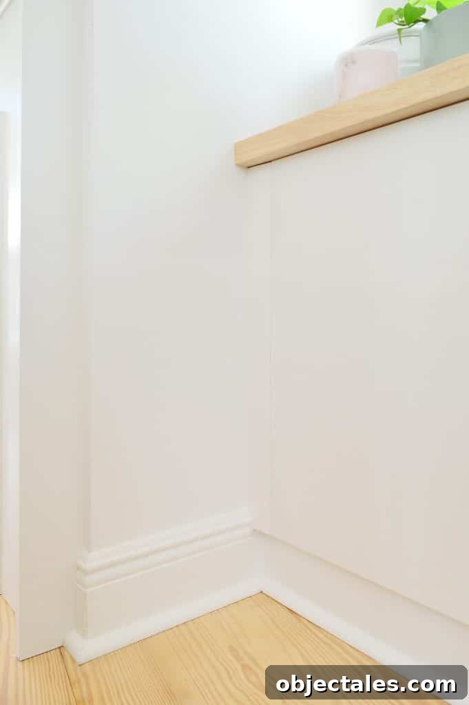 Convert IKEA Besta Cabinets Into Custom Built-Ins 9 Close up detail of trim added to side of Ikea Besta cabinets to look flush with doors