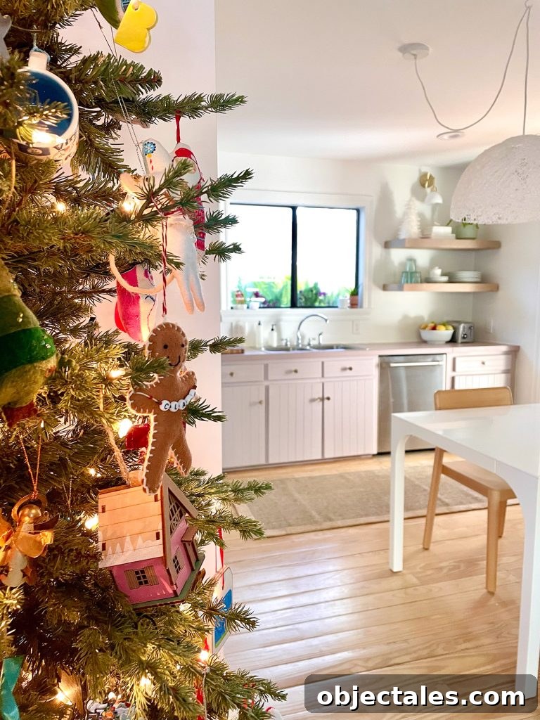 Side of Christmas tree near pantry in kitchen