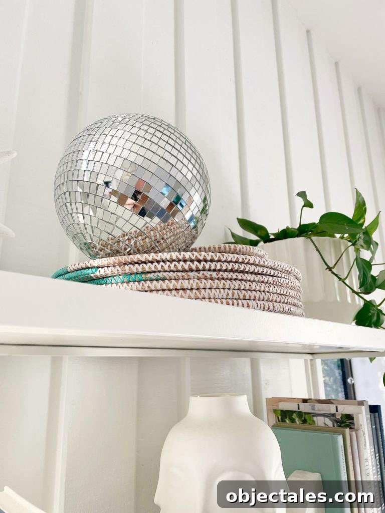 Decorative disco ball on top of shelves in office