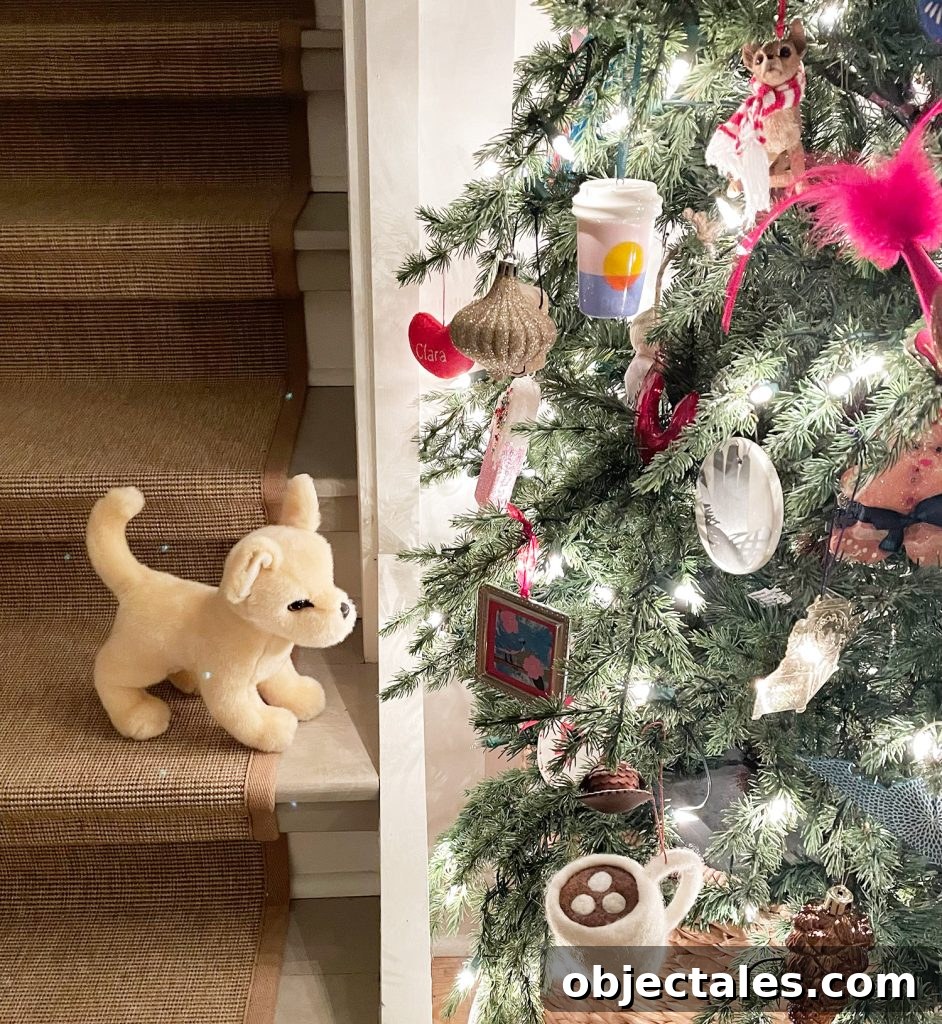 Chihuahua stuffed animal viewing Christmas Tree ornaments