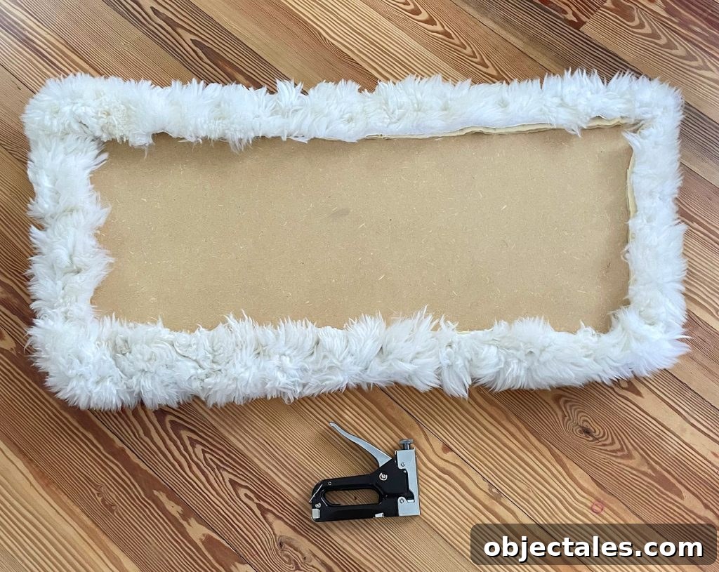 DIY Faux Sheepskin Seat Cushion Tutorial 6 Backside of loveseat seat upholstered with sheepskin rug