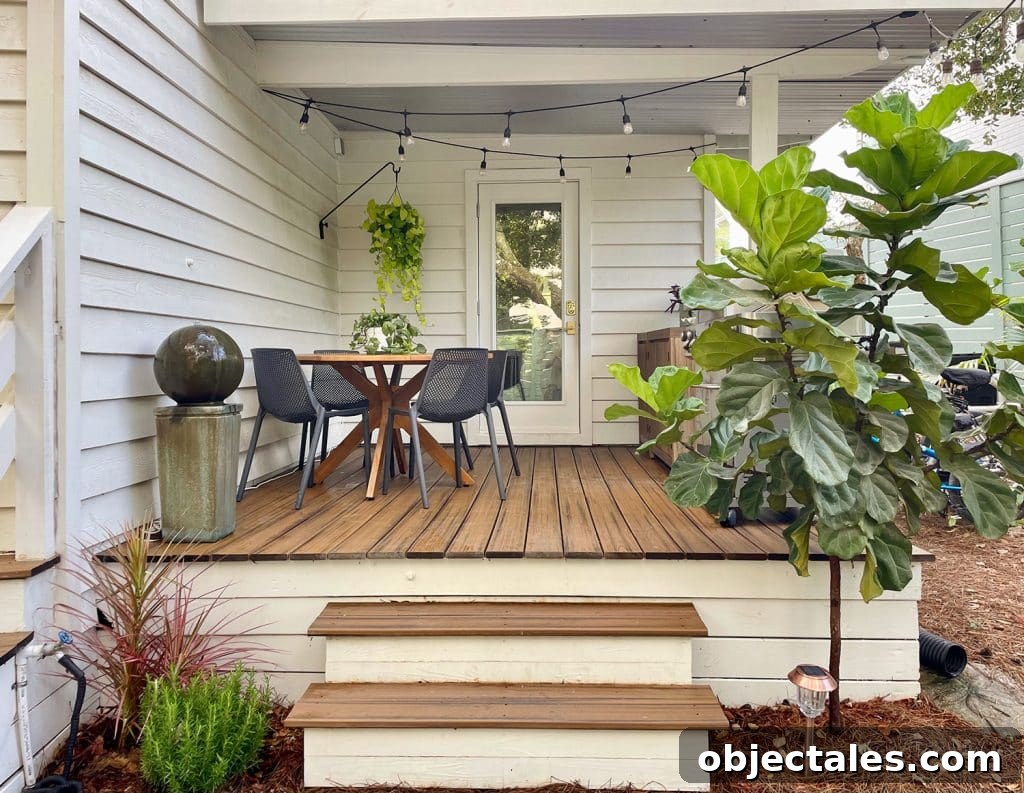 Add Outdoor Storage: Smart Shed, Cabinet, and Deck Ideas 13 Full View of Kitchen Porch With Outdoor Table Fountain And Fiddle Leaf Fig