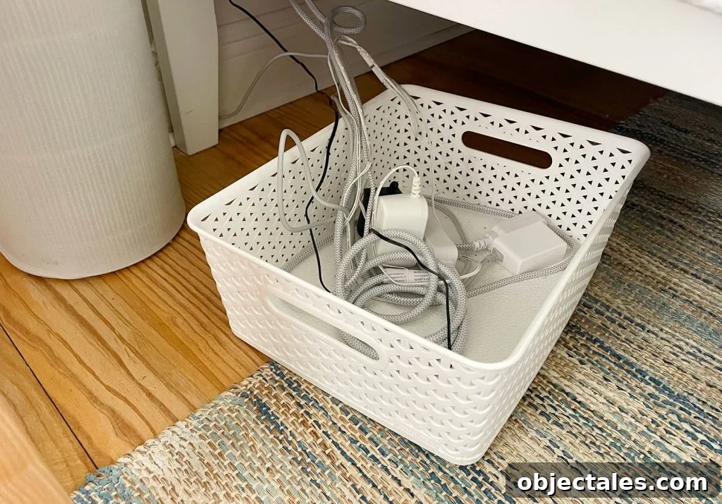 Low Bin Full Of Wires And Cords Under Bed