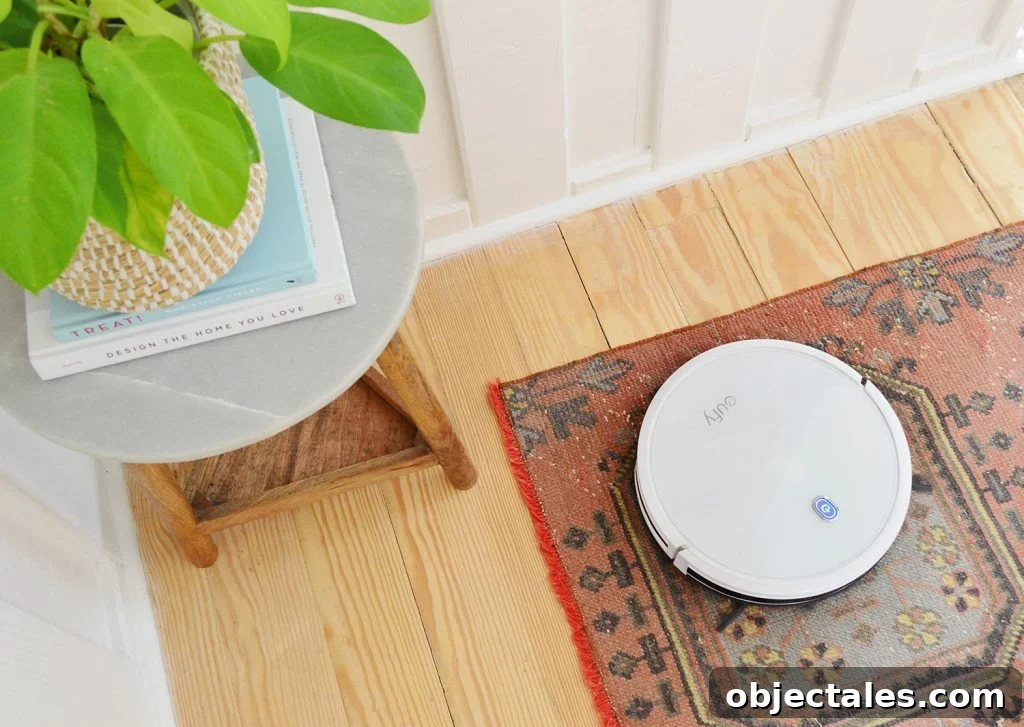 Eufy RoboVac 11S Robotic Vacuum On Traditional Runner