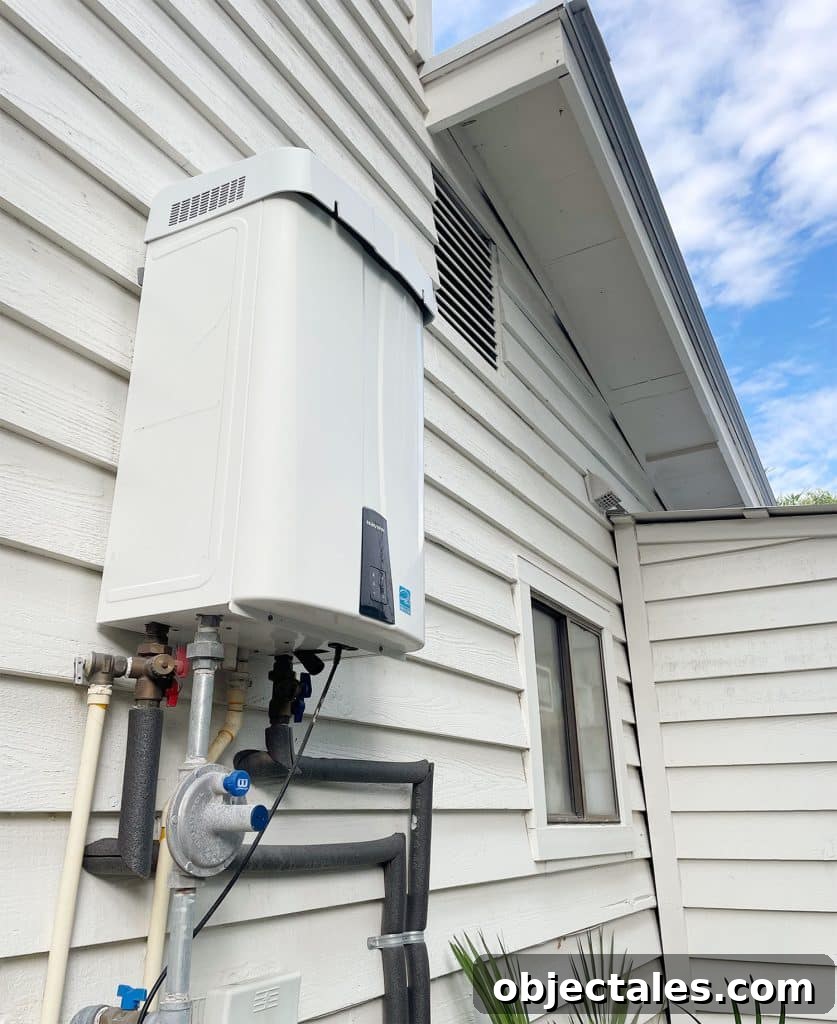 Outdoor gas water heater mounted to the siding of Florida home