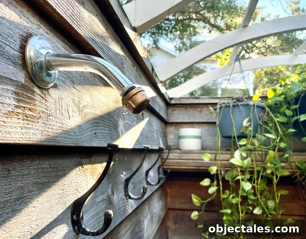 Outdoor Shower With Cap Placed On So It Can Drip To Prevent Freezing