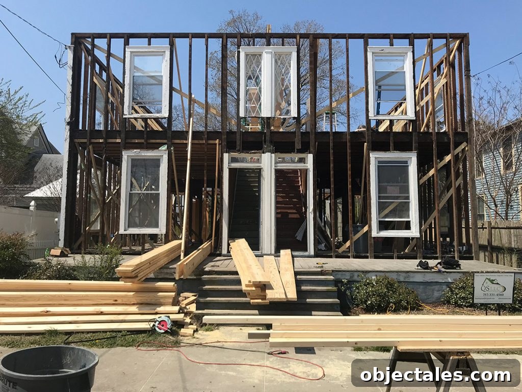Duplex renovation photos of home stripped to framing