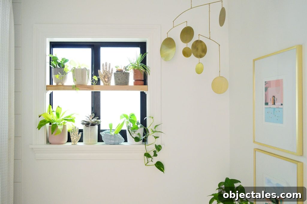 DIY Window Plant Shelf: Step-by-Step Tutorial 12 Wood window plant shelf in bathroom with gold mobile