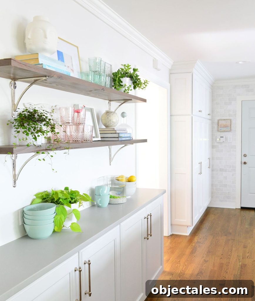 Reclaimed Wood Shelves With Polished Nickel Brackets In White Kitchen