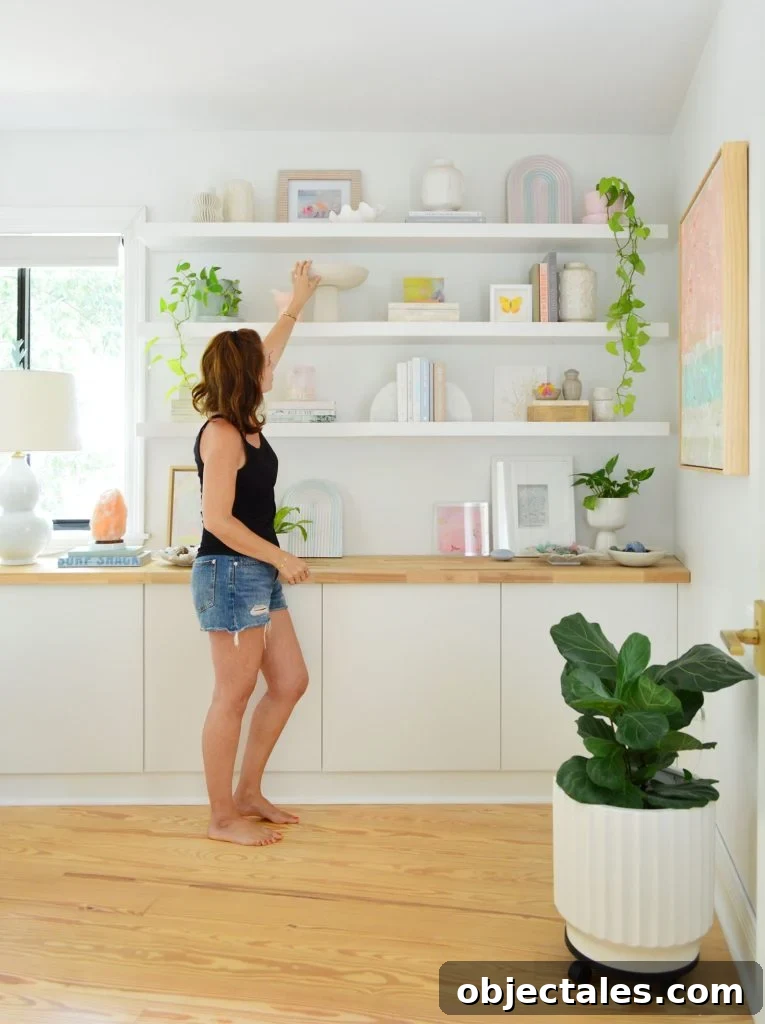 How We Installed IKEA Floating Shelves in Our Bedroom 11 Sherry Reaching For Bowl On Ikea Lack Floating Shelf