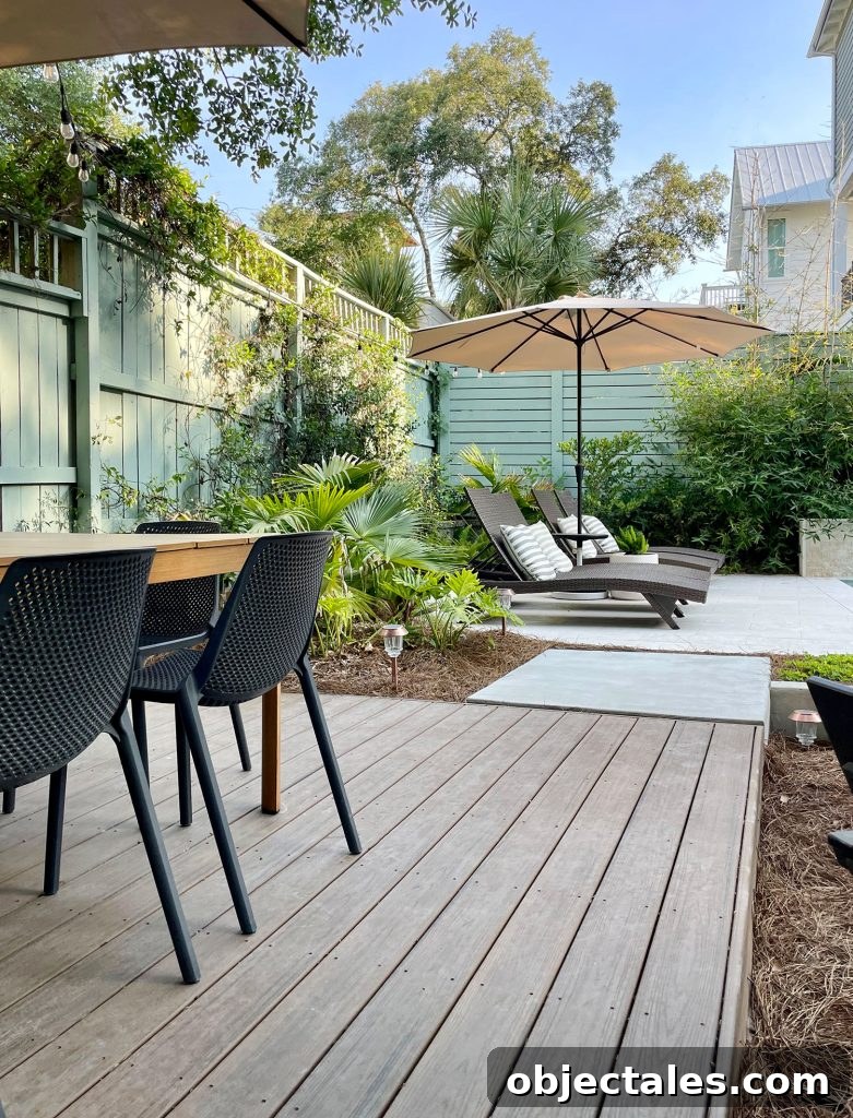Trex Platform Deck With Dining Table By Backyard Pool 