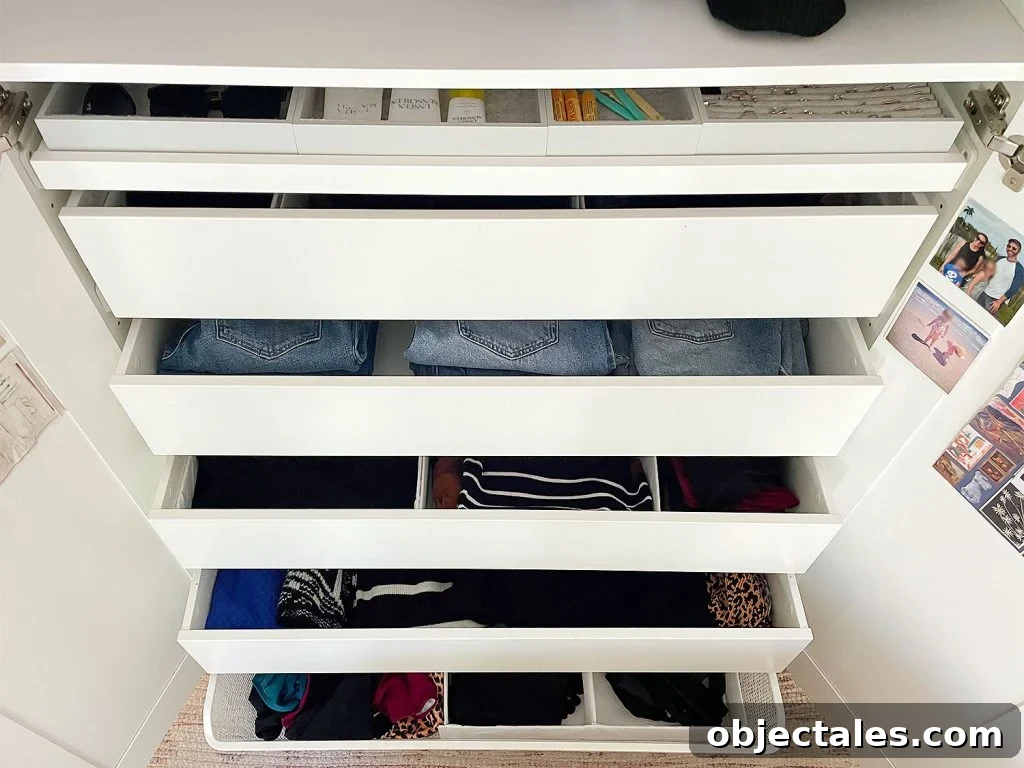 IKEA PAX Closet Organization: How We Transformed Our Space 12 Ikea Pax Wardrobe Closet Drawers Open With Womens Clothes