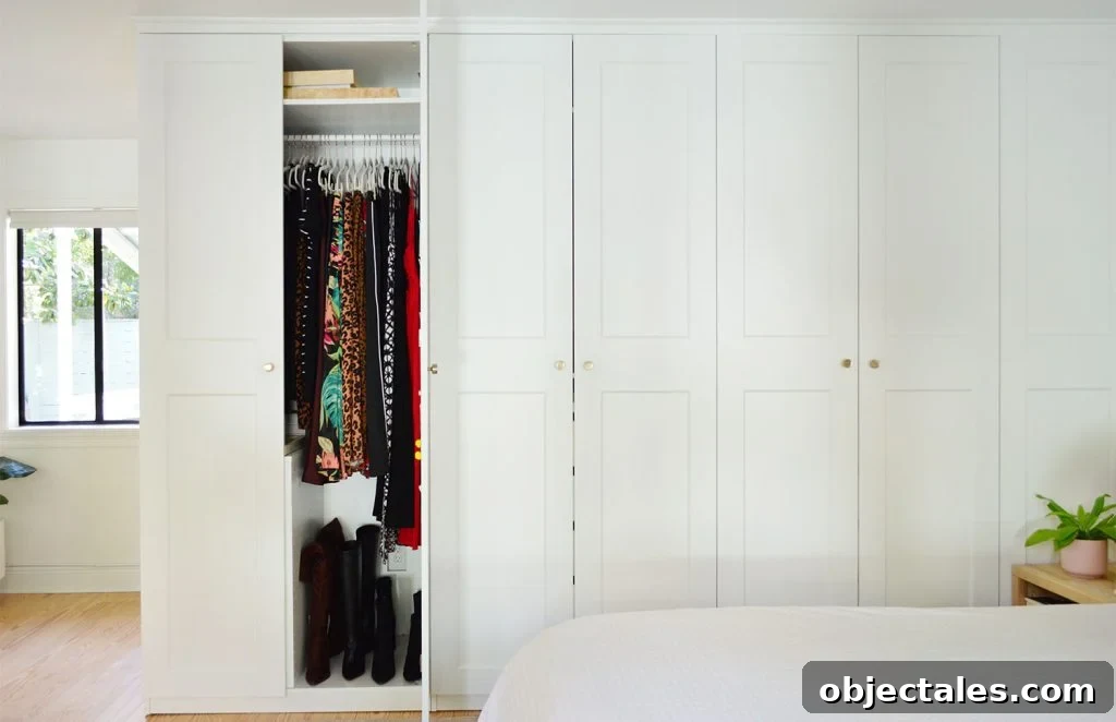 IKEA PAX Closet Organization: How We Transformed Our Space 3 Wall Of Ikea Pax Wardrobe Closets With One Open Door