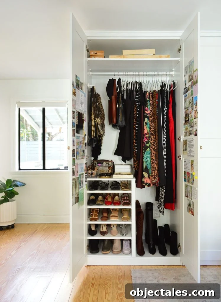 IKEA PAX Closet Organization: How We Transformed Our Space 5 Open Ikea Pax Closet Wardrobe With Long Hanging Clothes And Shoe Storage