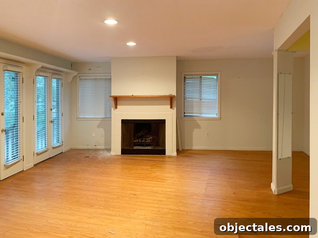 6 Bedroom Upgrades That Transformed Our Space 3 Before photo of bedroom with fireplace and blinds on windows
