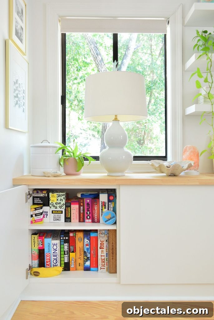 6 Bedroom Upgrades That Transformed Our Space 14 Ikea Besta Cabinet With Door Open Showing Family Board Game Storage