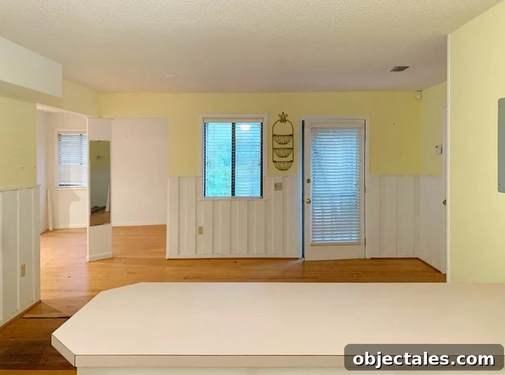 6 Bedroom Upgrades That Transformed Our Space 18 Before photo of kitchen with yellow walls into bedroom