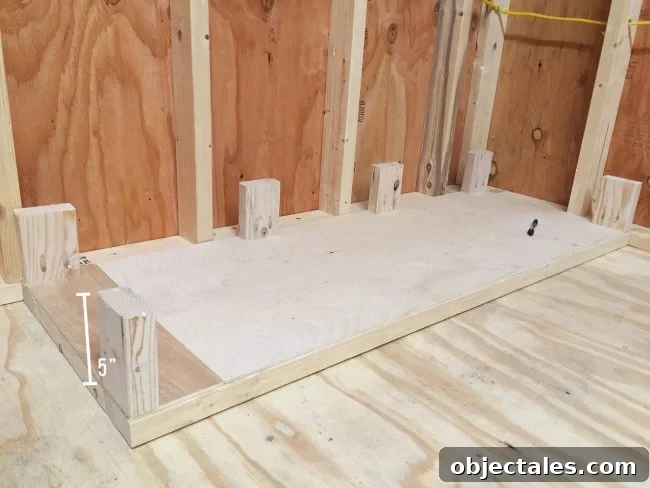 DIY Scrap Wood Storage: Build It From Leftover Lumber 8 Adding small 5 inch posts to bottom of scrap wood storage organizer