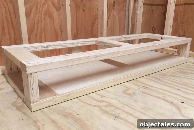 DIY Scrap Wood Storage: Build It From Leftover Lumber 9 adding second level to the bottom of a simple scrap wood storage organizer