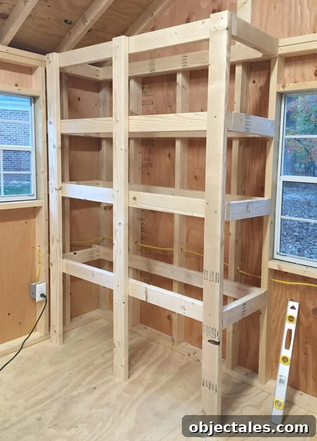 Build Sturdy DIY Garage Shelving: Step-by-Step Plans 11 heavy duty wood garage shelving before plywood tops are applied
