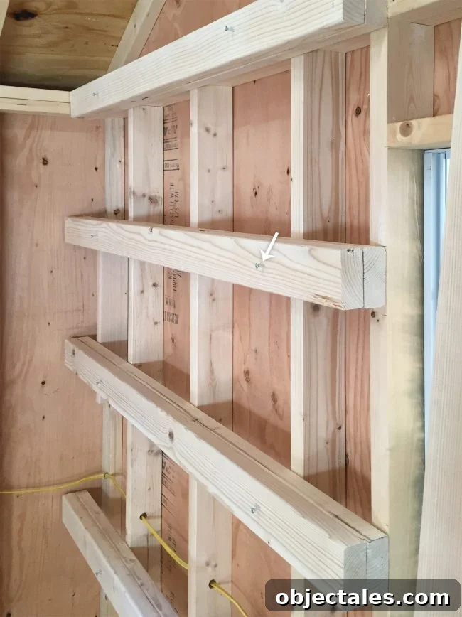 Build Sturdy DIY Garage Shelving: Step-by-Step Plans 7 temporary screws into horizontal shelf supports for garage shelving