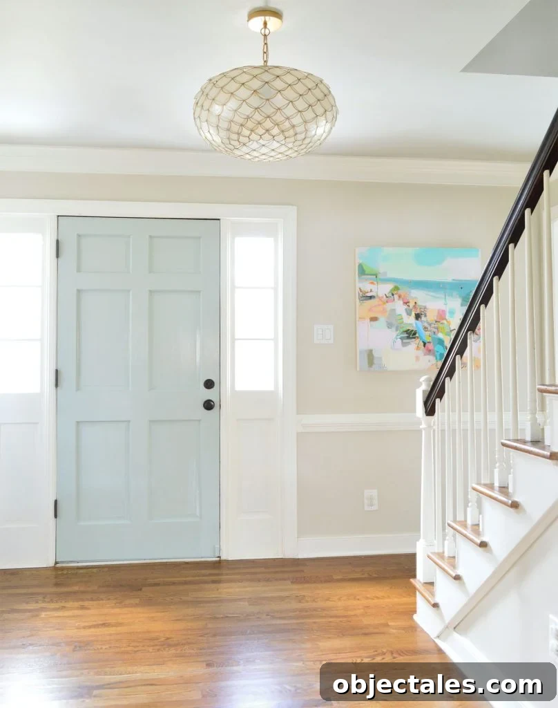 Benjamin Moore Edgecomb Gray: A Versatile Greige for Any Room 14 Entrway With Edgecomb Gray Paint And Soft Blue Door