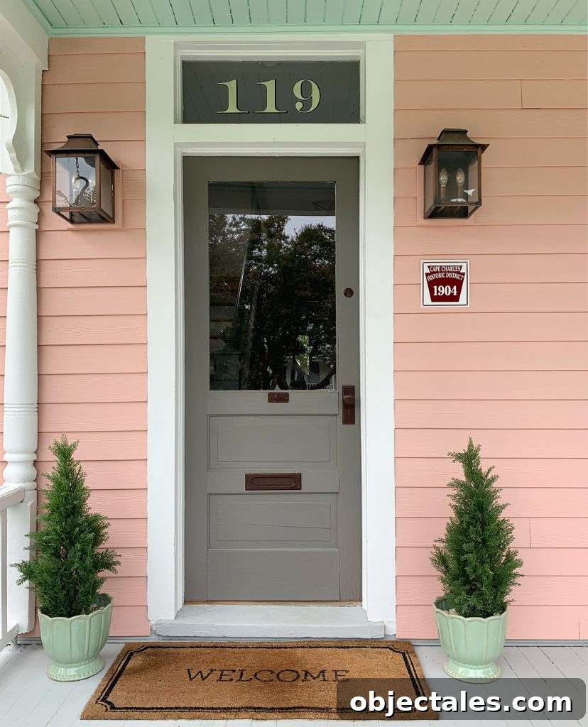Pink Beach House Historic Front Door With Pure White Trim