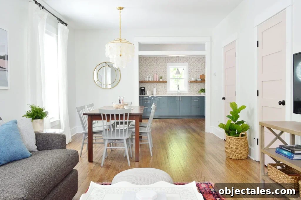 Open Concept Living Room With Pink Doors Extra White Trim