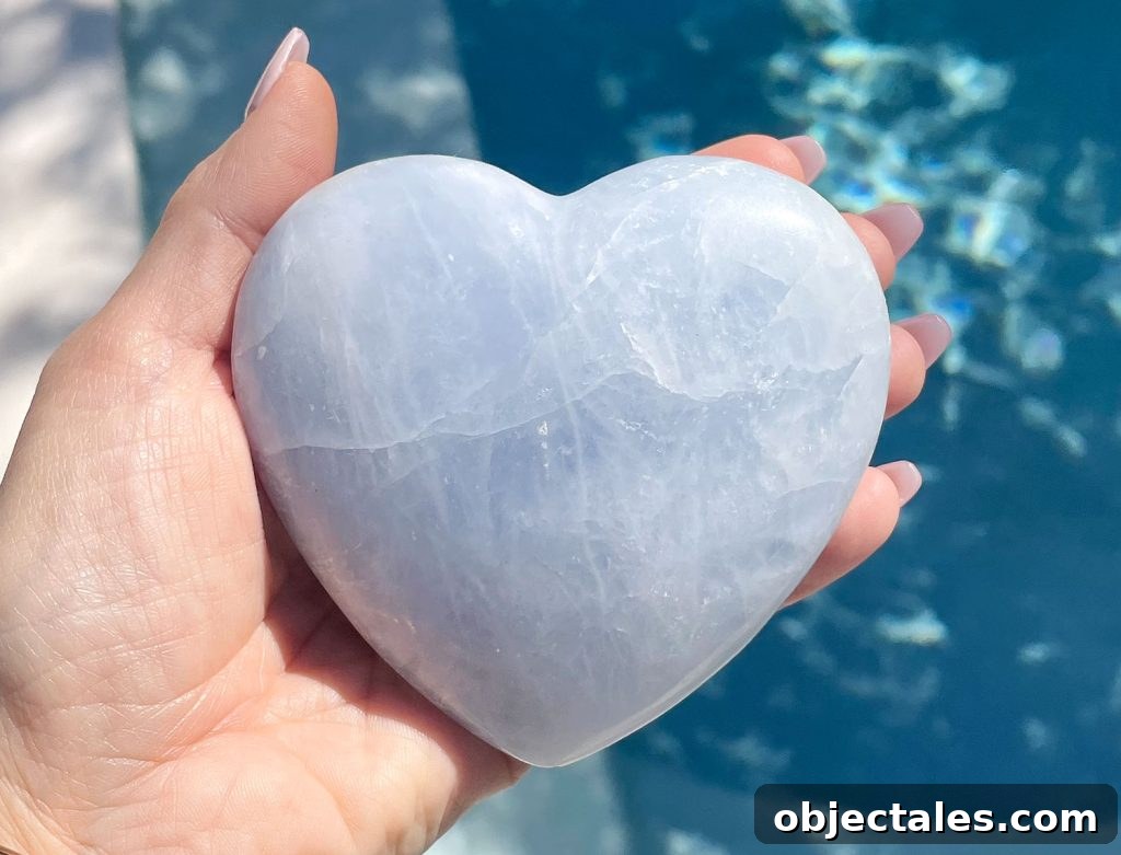 Blue Calcite Crystal: Meaning, Properties and Uses 3 Blue Calcite Heart Crystal Over Water