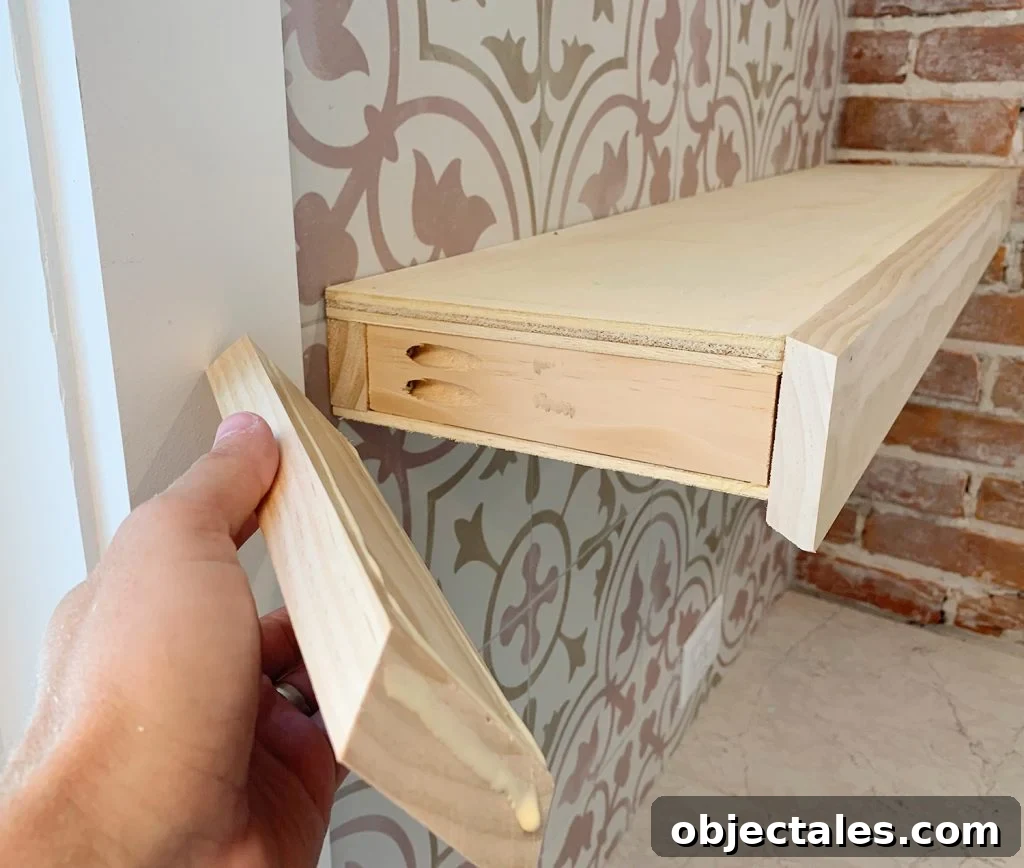 How to Build Floating Kitchen Shelves 12 Hand Adding Side Trim Piece To DIY Floating Kitchen Shelves