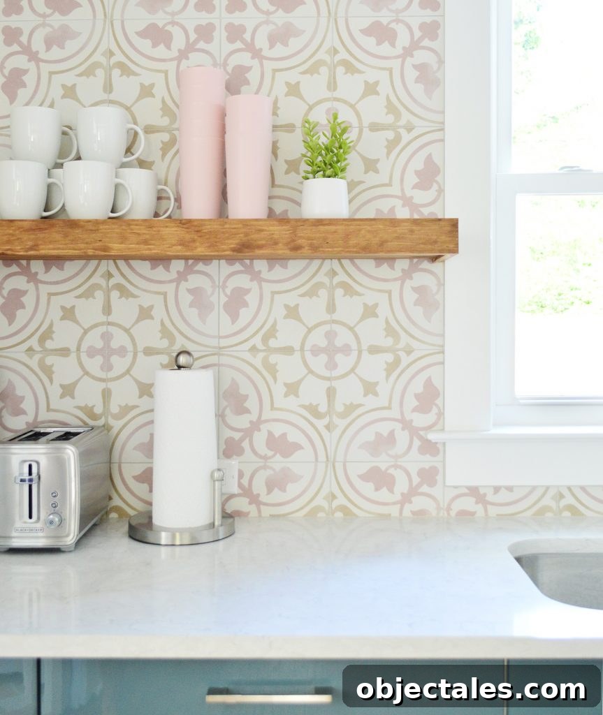 How to Build Floating Kitchen Shelves 3 Wood Toned Floating Kitchen Shelf Against Pink Patterned Tile Backsplash