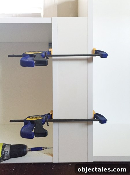 How to Build Custom Built-In Cabinets: Step-by-Step 7 how to add filler pieces to Ikea cabinets using clamps and screws
