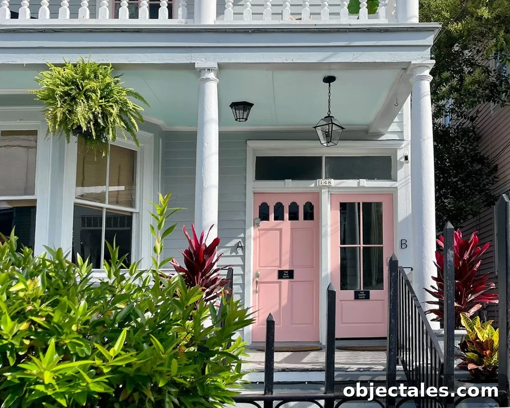 Southern Home With Pink Doors And Haint Blue Porch Ceiling