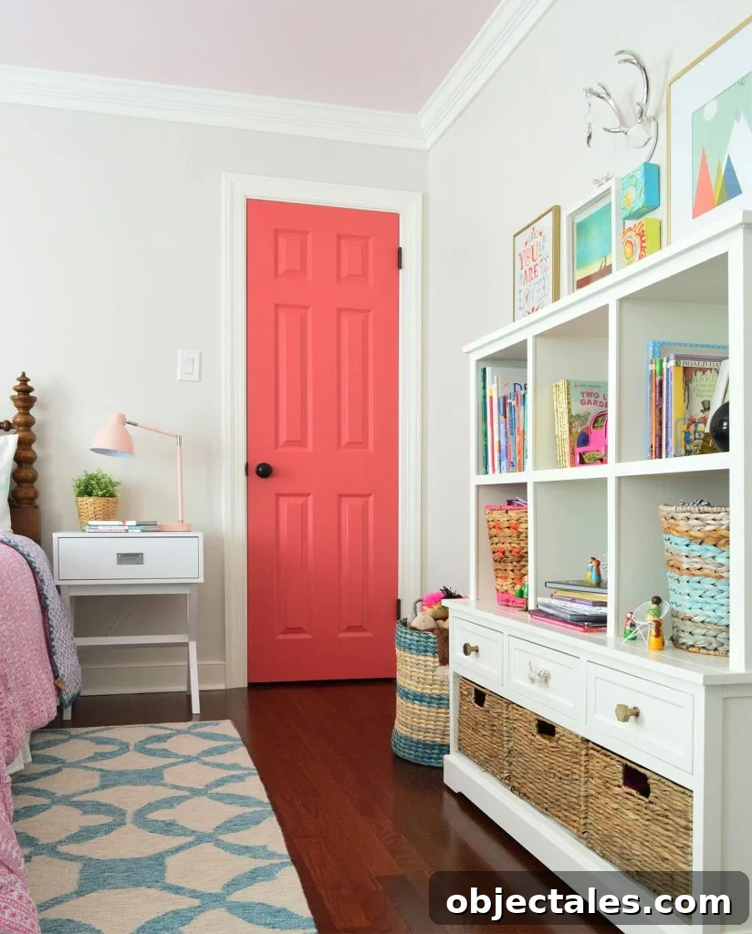 Girls Bedroom With Greige Walls And Simply White Trim And Pink Door