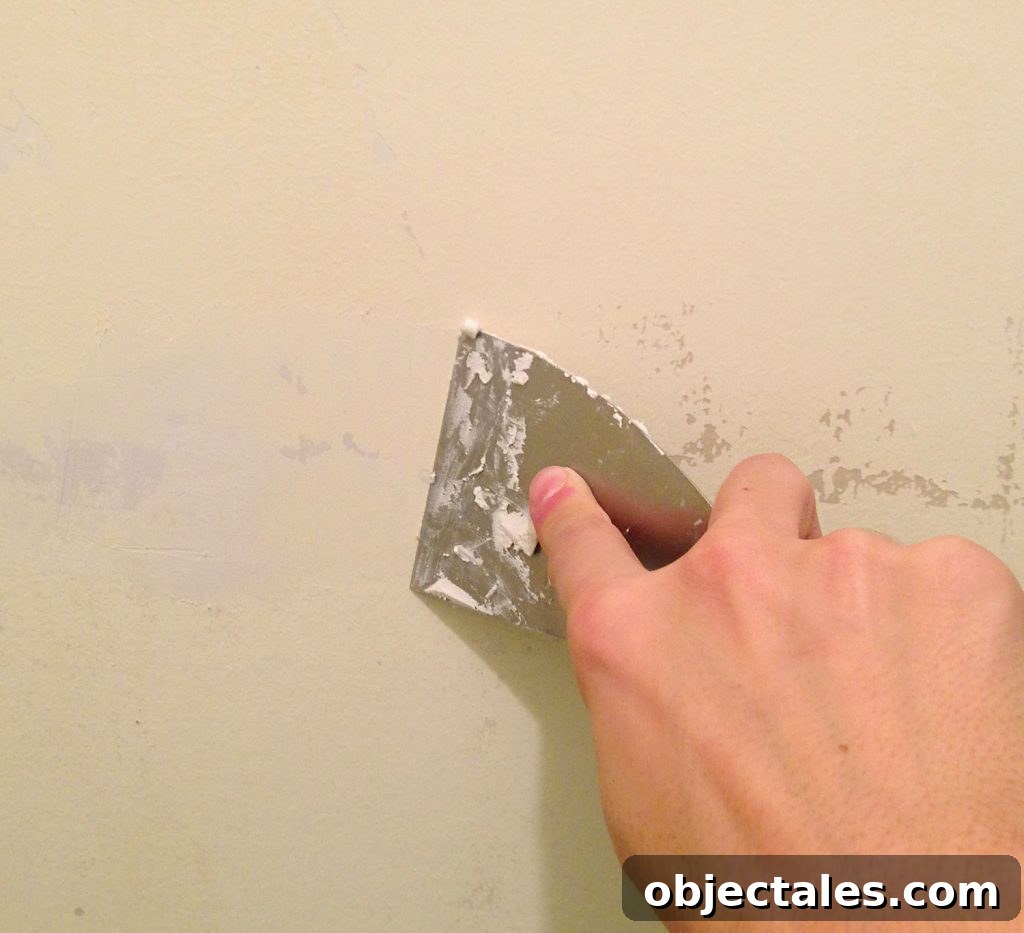 How to Remove Wallpaper Without Damaging Walls 18 Spackling Peeled Paint Patches With A Putty Knife