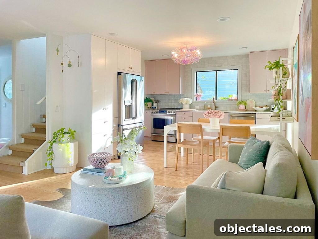 Small Ikea Kitchen With Mauve Cabinets And Glass Bubble Light Fixture
