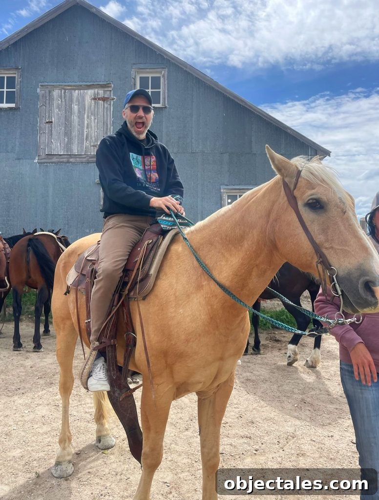 John Riding Horse In South Dakota In Front of Barn