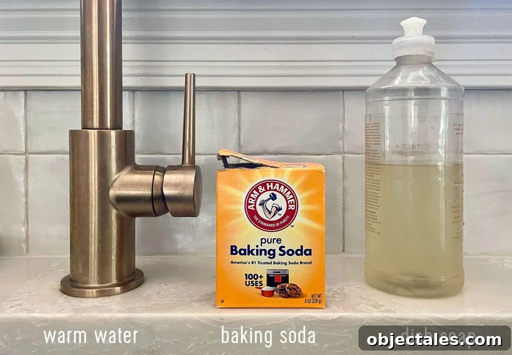 3 Supplies for cleaning a stainless steel sink warm water baking soda dish soap