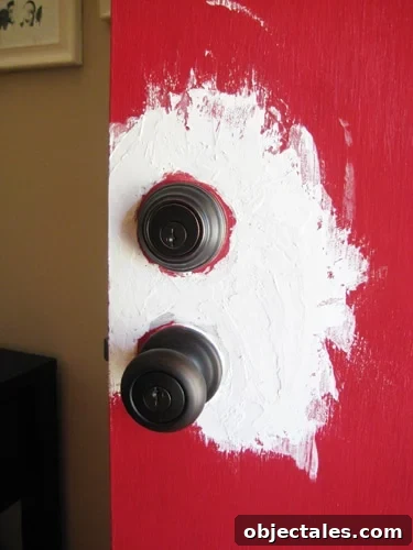 Spackling the painted area