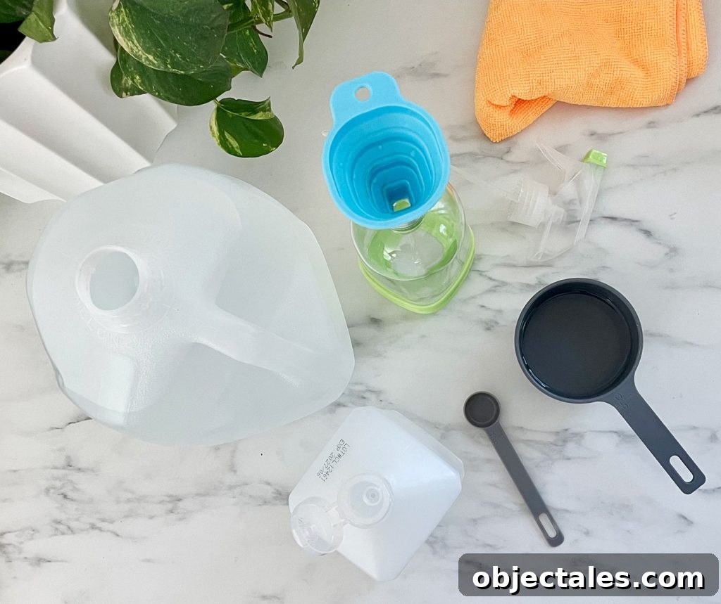 Overhead View Of Mixing Homemade Glass Cleaner