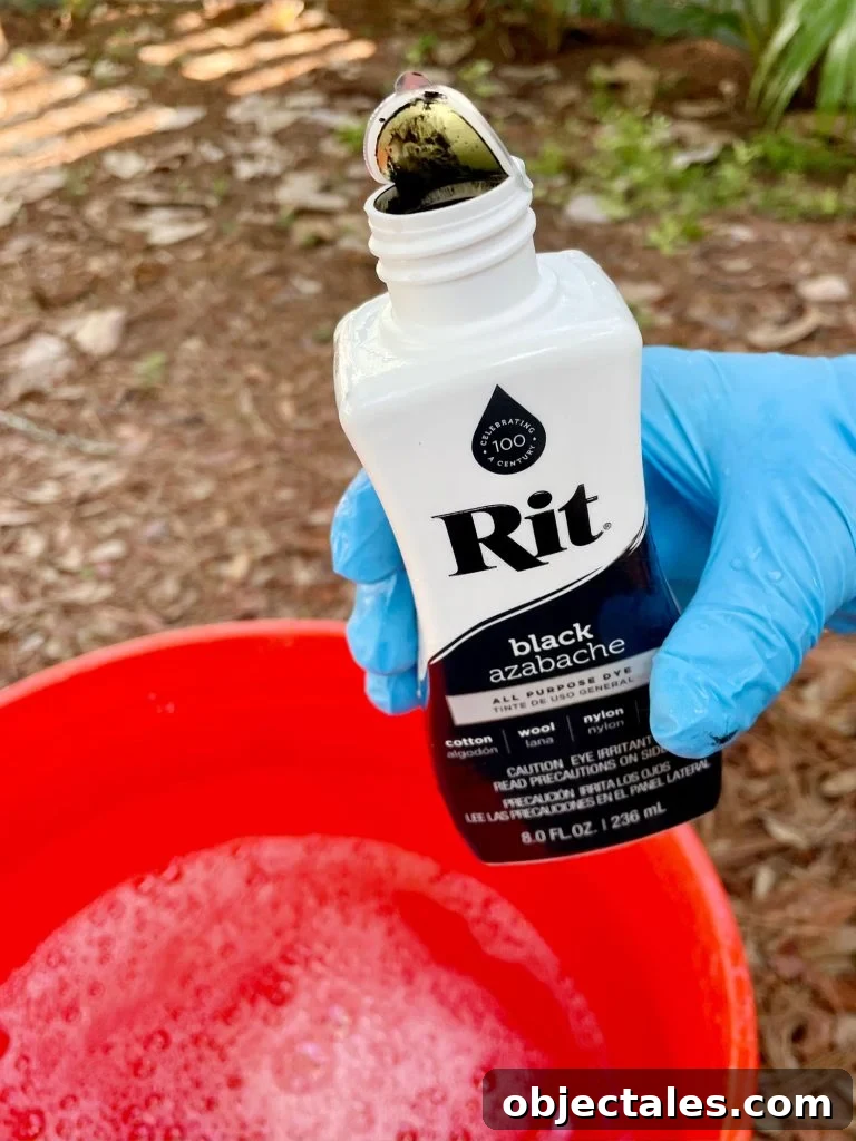 How to Dye Clothes at Home: Step-by-Step Tutorial 6 Bottle Of Black Rit Dye Over Bucket Of Hot Water
