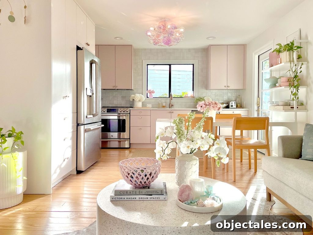 Small Ikea Kitchen With Mauve Cabinets And Seating Area With Terrazzo Coffee Table