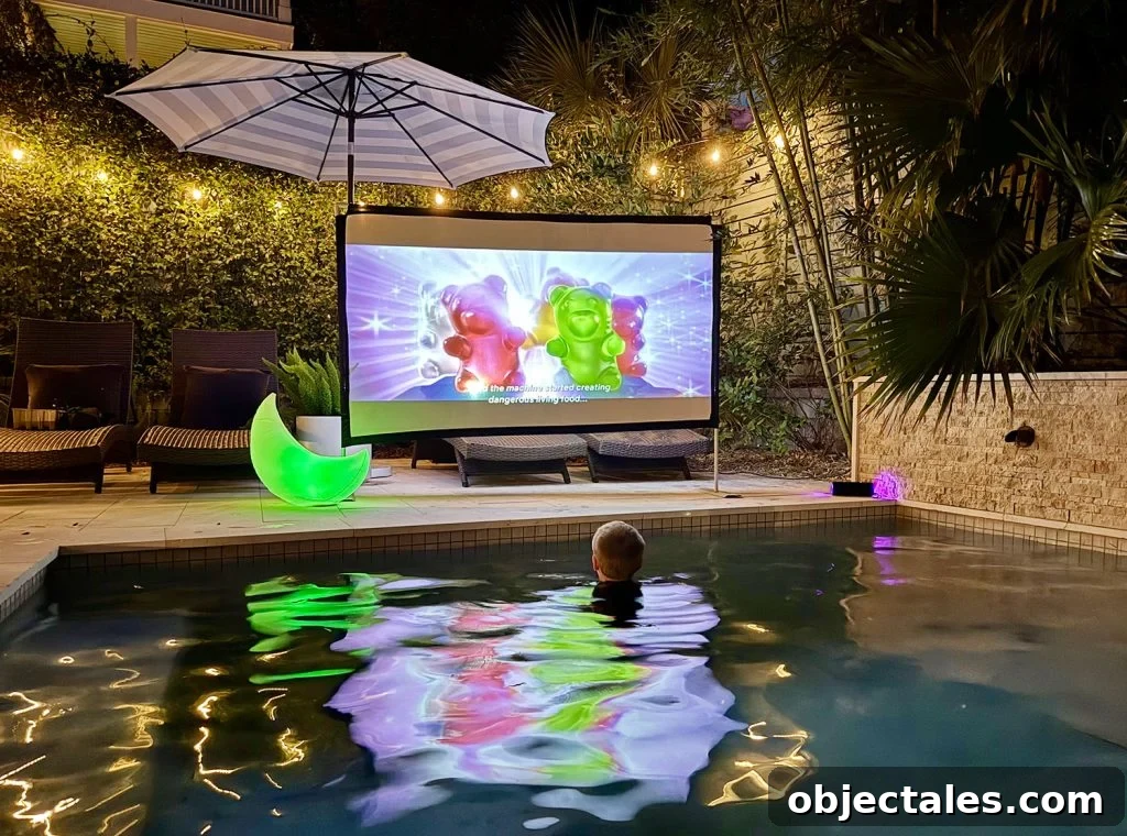 Host an Outdoor Movie Night: Gear Under $200 2 Outdoor Movie Night In Pool With Projector And Screen