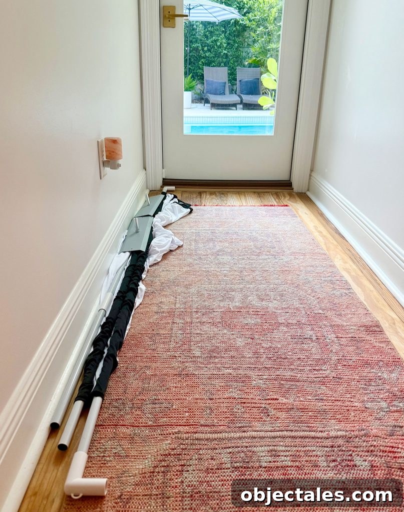Host an Outdoor Movie Night: Gear Under $200 14 Outdoor Movie Screen Broken Down And In Hallway