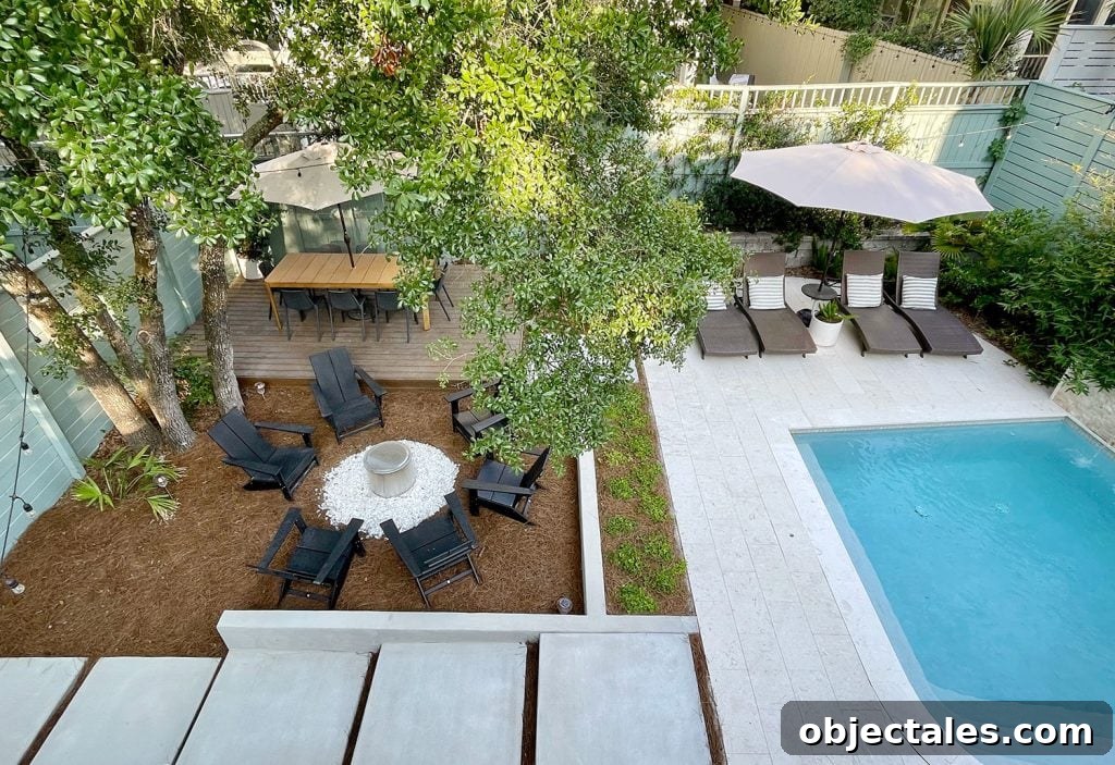Host an Outdoor Movie Night: Gear Under $200 18 Overhead View Of Backyard Straight On With Large Concrete Paver Stones