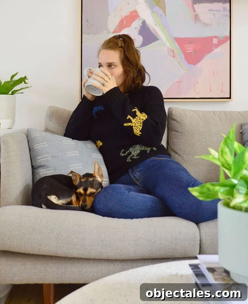 Sherry Sitting With Penny Dog On Couch Drinking Tea