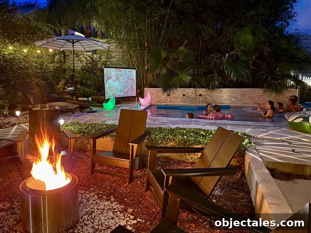 Backyard Pool Area With Firepit And Outdoor Movie Screen